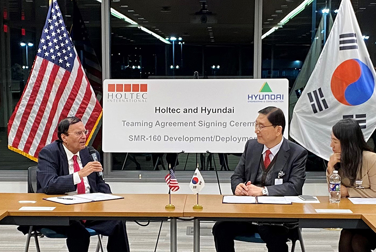 Photograph of signing ceremony of the Teaming Agreement for joint development and joint deployment of small module reactor. Dr. Kris Singh CEO of Holtec and Hyundai E&C President Yoon Young-joon (right side) are signing the Teaming Agreement.